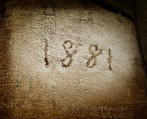This 1881 was scribed into a plaster patch in the basement. We don't know if that is the date the house was built. The basement walls are whitewashed brick, but the foundation of the rest of the house is limestone block.